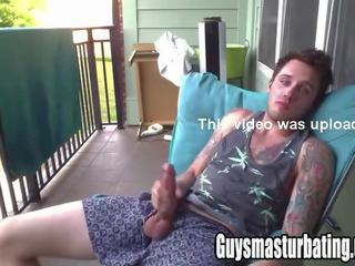 Extraordinary tattooed adolescent jerking off on his balcony